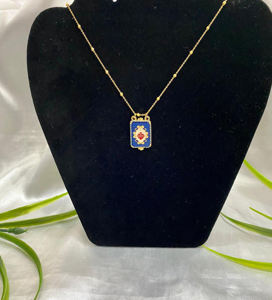 Cadena Chapa de oro con placa Sagrado corazón.