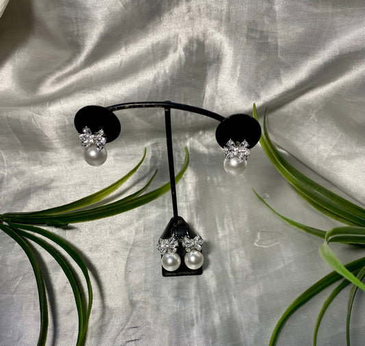 Arete con moño y perla