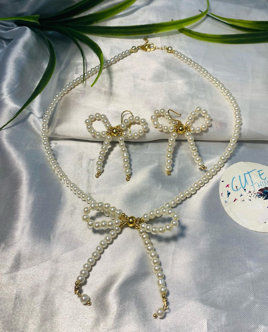 Collar y arete Coquette