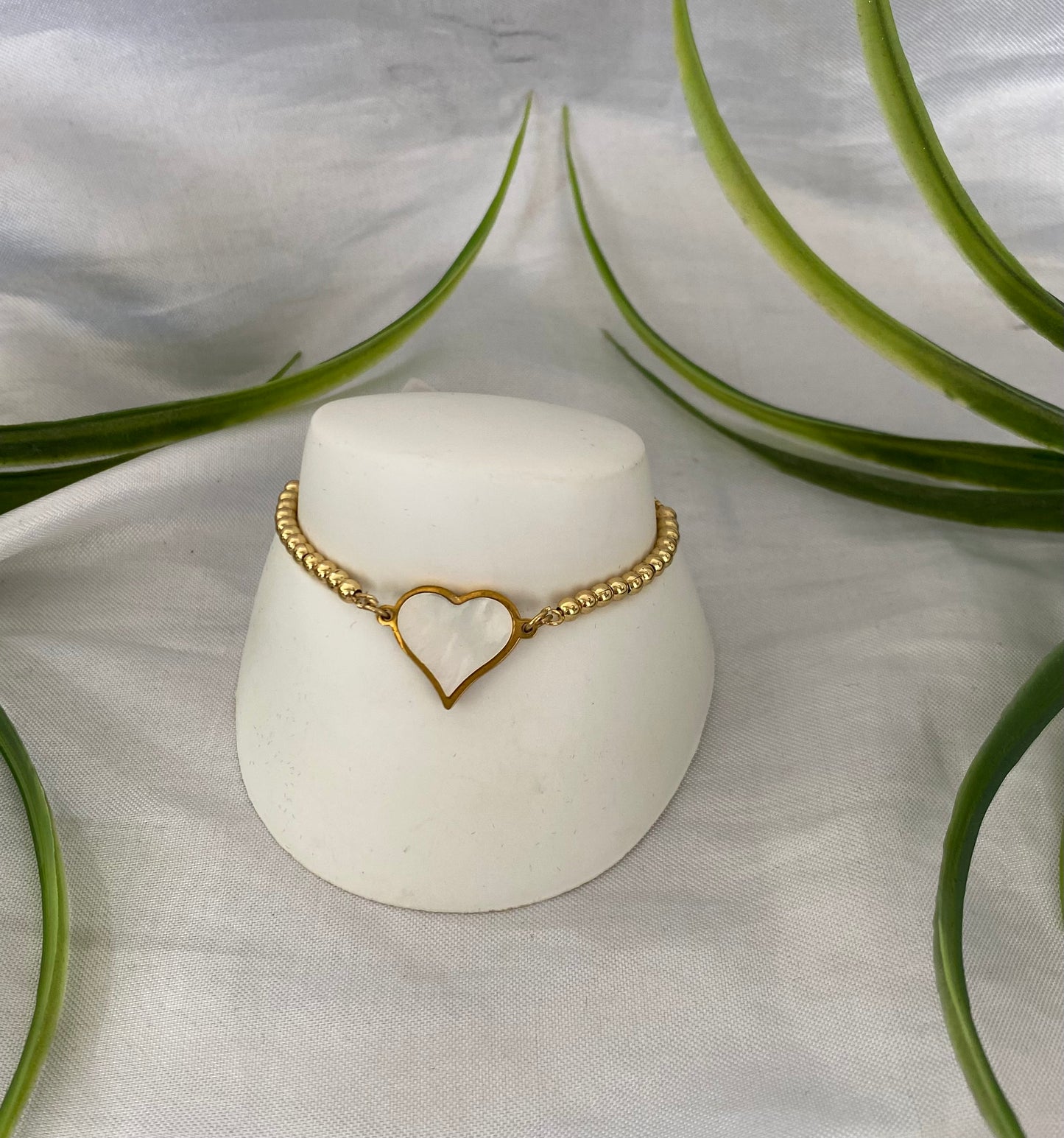 Pulsera de elevador de con dije concha nácar