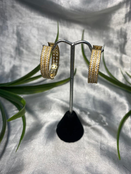 Arracadas tipo Huggies Chapa de oro.