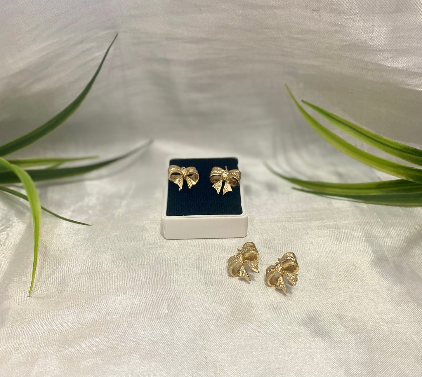 Aretes moño bicolor