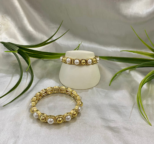 Pulsera cuadros bolitas doradas con Perla