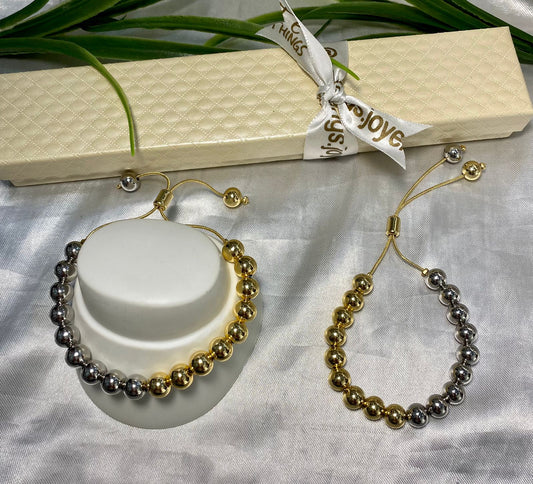 Pulsera de elevador bicolor con bola #8 laminado.